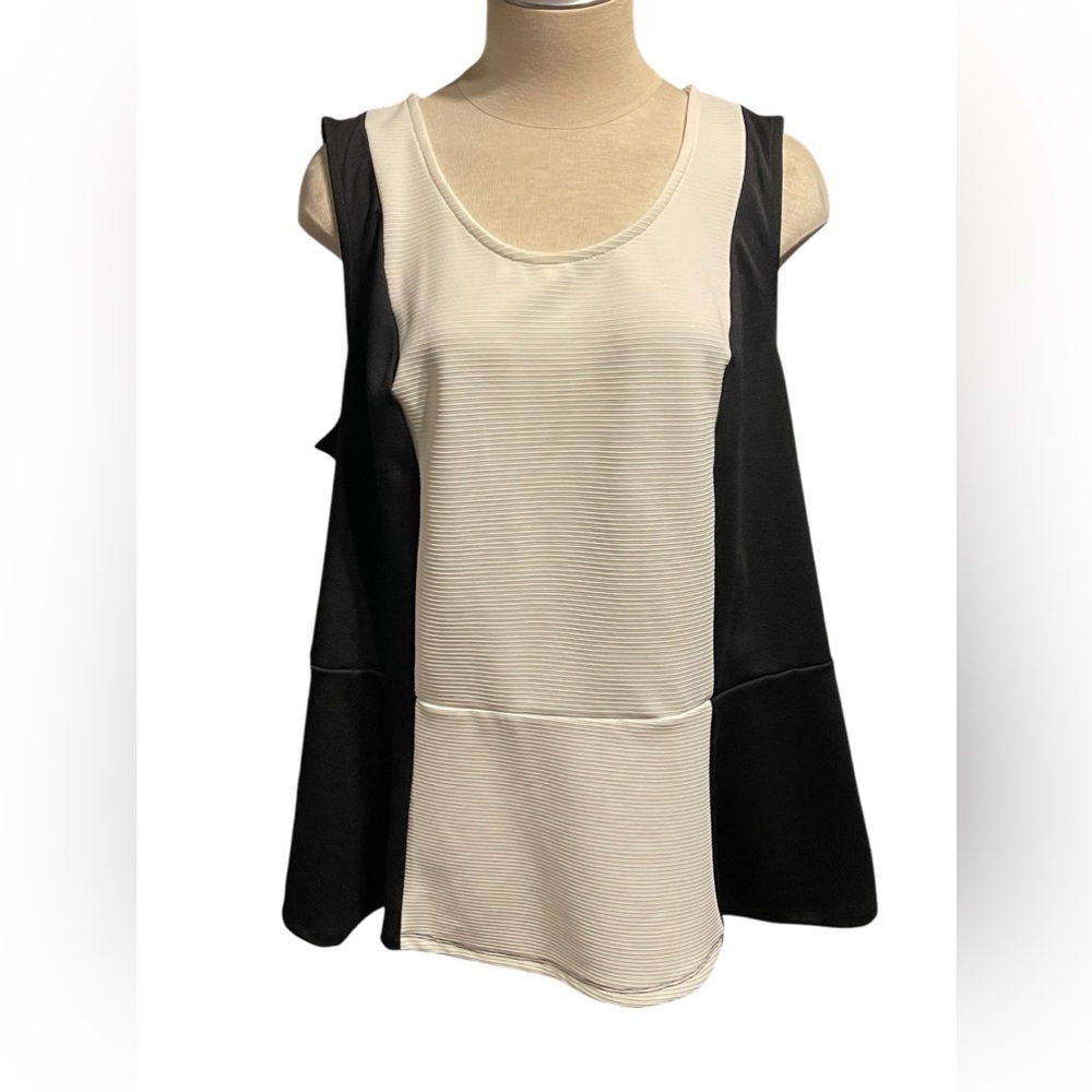 PURE ENERGY: Black and White Sleeveless Peplum Top